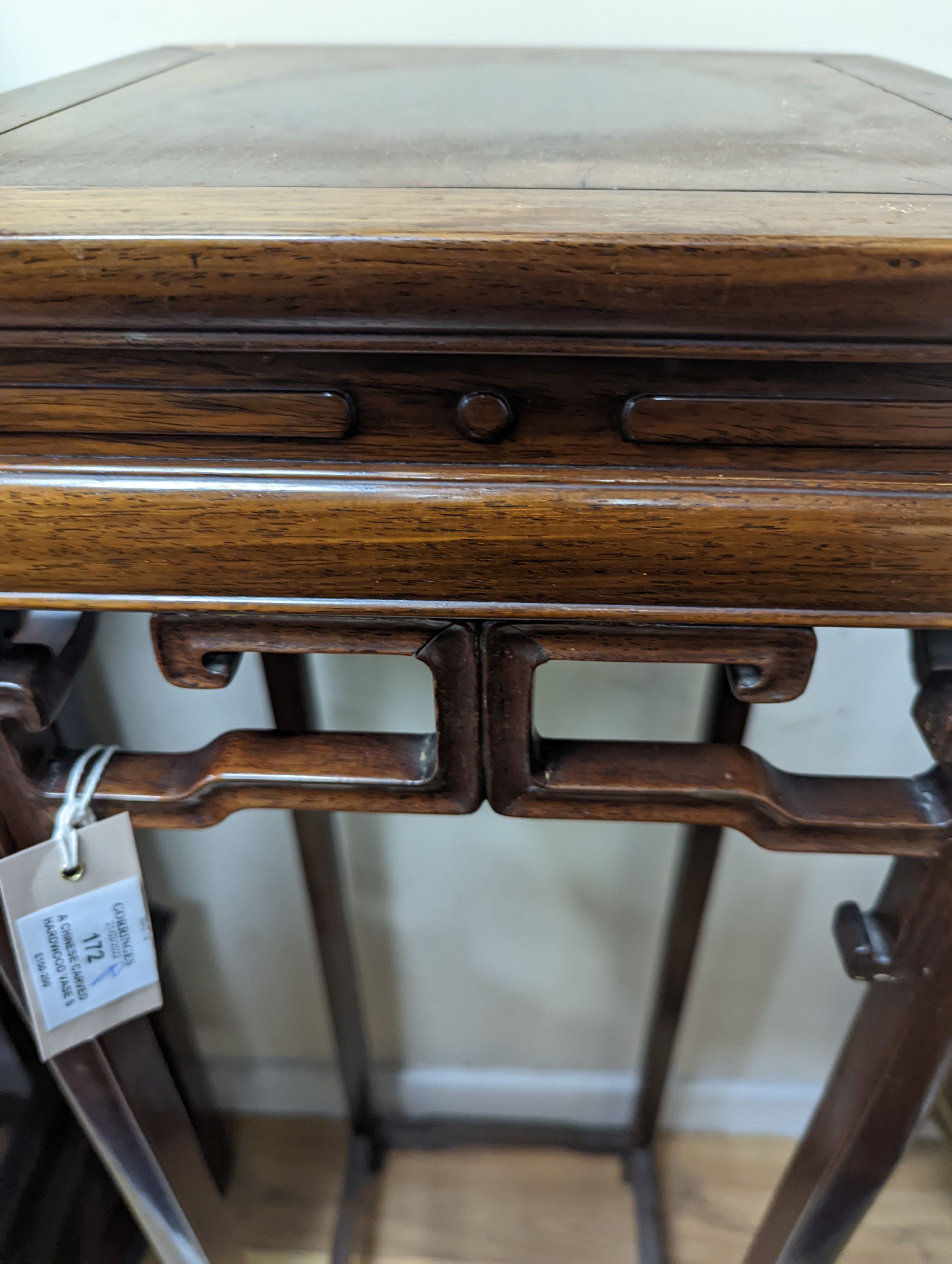 A Chinese carved hardwood vase stand, width 32cm, depth 33cm, height 110cm